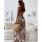 Ärmlös jumpsuit med vida ben och off shoulder