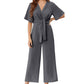 Elegant V-ringad jumpsuit med vida ben och knytband i midjan för kvinnor