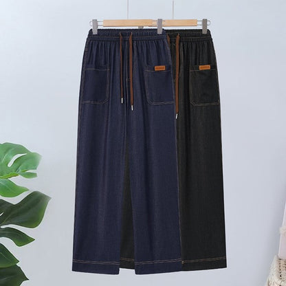 Byxor med hög midja, raka ben och dragsko