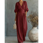 Elegant V-ringad jumpsuit med vida ben